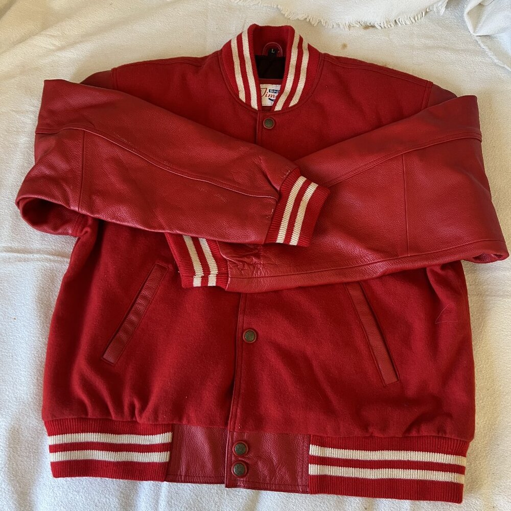 Versity Jacket ( brand New ) leather sleevs and woolen body.